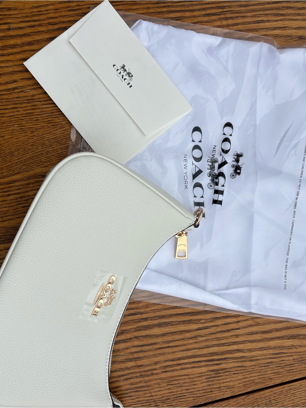 Coach Pebbled Leather Crescent Shoulder Bag in White with Gold Hardware - Coach